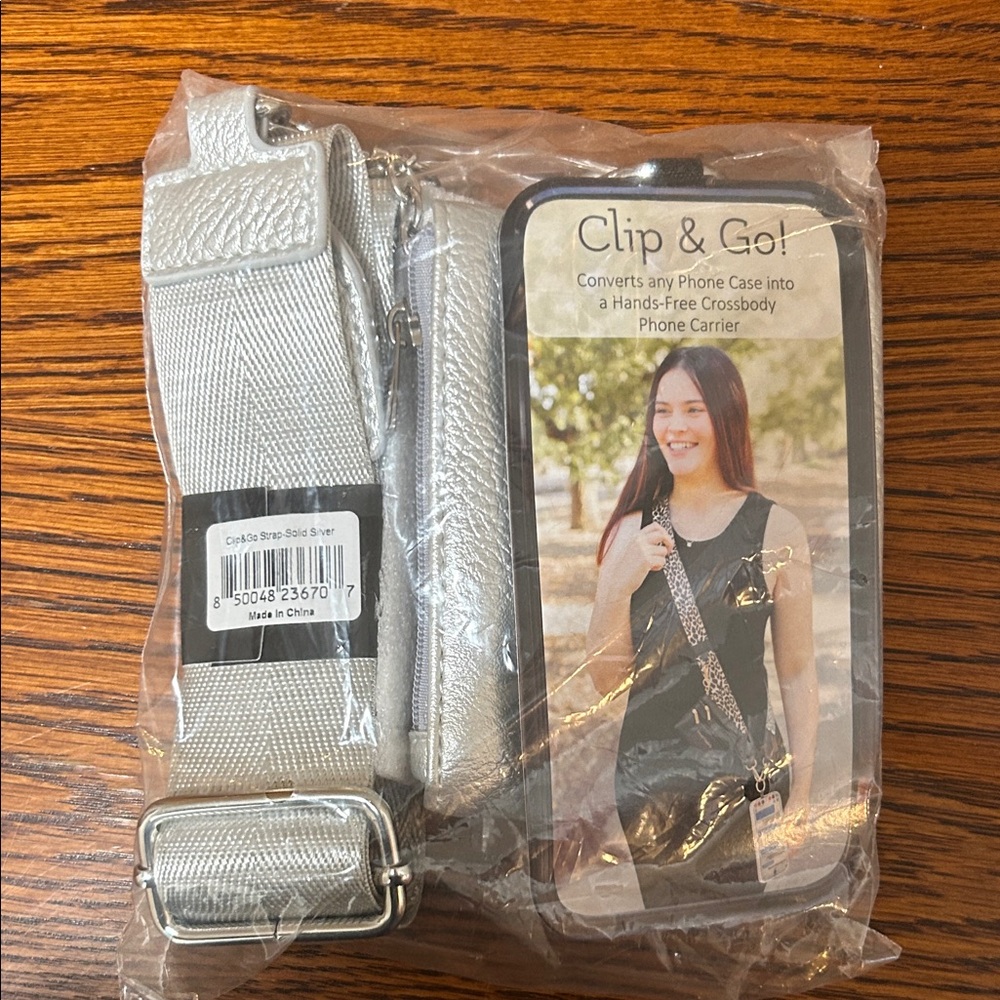 Hands free crossbody phone carrier.